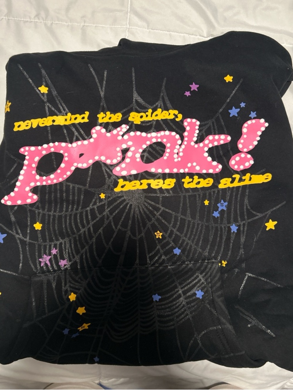 Black Hoodie with Pink Polka-Dot Graphic and Yellow Script